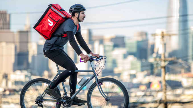 A photo of a Doordash delivery driver